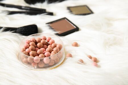 Ball blush and decorative cosmetics on a white backgroundの写真素材
