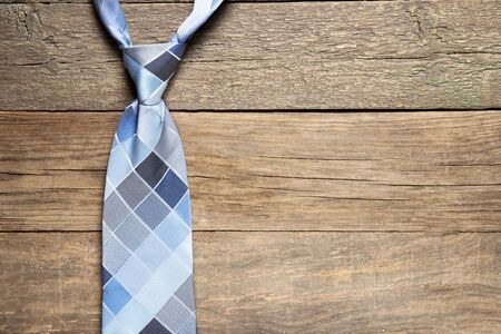 Tie on a wooden background. Place for text. Holiday daddy's dayの写真素材