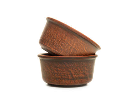 Brown ceramic bowl isolated on white backgroundの写真素材
