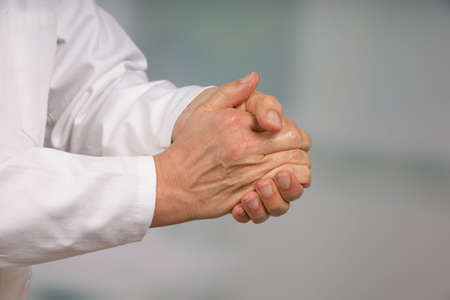 Close up of doctor's hand cleaning with disinfectant soap for hygienic reasonsの写真素材