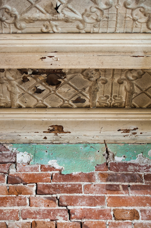 Vintage textures: old wallpaper, peeling paint, brick wall and layers of different colorful backgrounds.の写真素材
