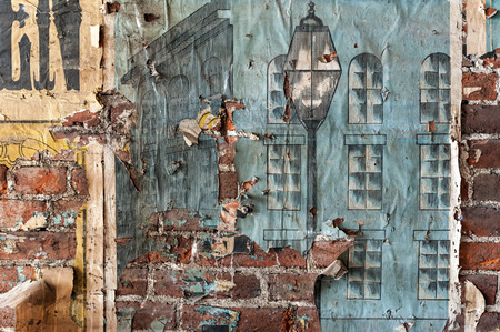 Vintage textures: old wallpaper, peeling paint, brick wall and layers of different colorful backgrounds.の写真素材