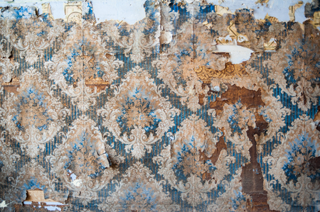 Vintage textures: old wallpaper, peeling paint, brick wall and layers of different colorful backgrounds.の写真素材