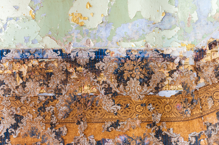 Vintage textures: old wallpaper, peeling paint, brick wall and layers of different colorful backgrounds.の写真素材