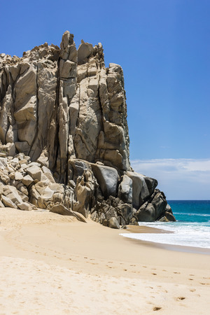 Rock formations and white sandy beach around the Arch in Cabo San Lucas, Mexico.の写真素材