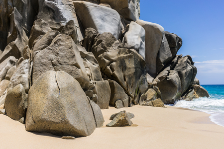 Rock formations and white sandy beach around the Arch in Cabo San Lucas, Mexico.の写真素材