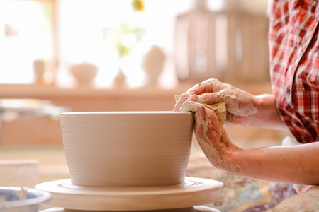 to woman potter pottery handsの写真素材