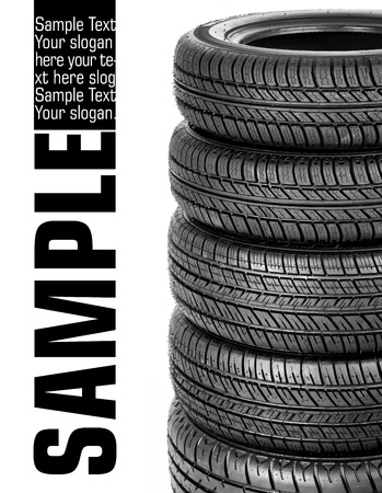 Tires stacked up and isolated on white backgroundの写真素材