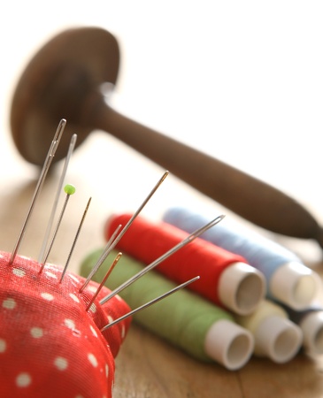 Colorful thread spools and needle の写真素材
