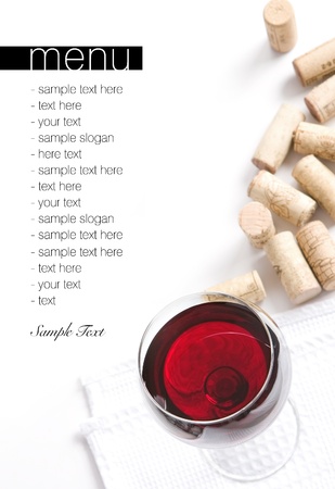 Winery menu project  Various corks and glass filled with red wine  Space for text isolated on white  の写真素材