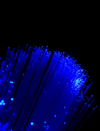 Blue light on black backgroundの写真素材