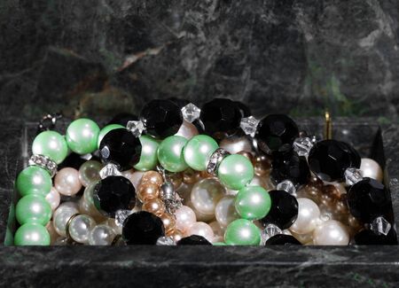 malachite jewelry box with jewelry - Treasure of pearlsの写真素材