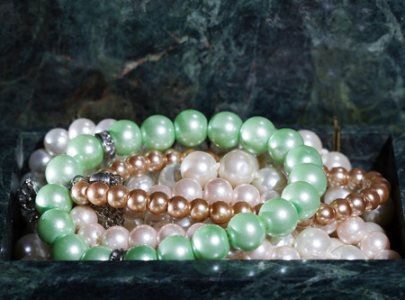 malachite jewelry box with jewelry - Treasure of pearlsの写真素材