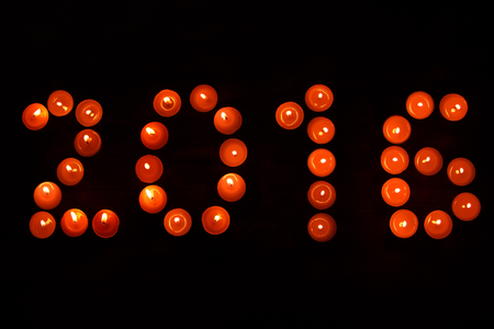 New Year 2016 from candles on a dark backgroundの写真素材