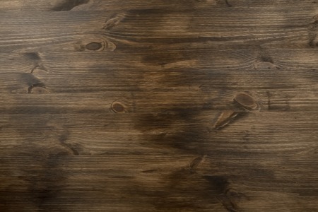 brown texture of old wood with knotsの写真素材