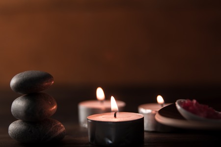 Beautiful Spa composition with aroma candles on wooden . Treatment, aromatherapyの写真素材