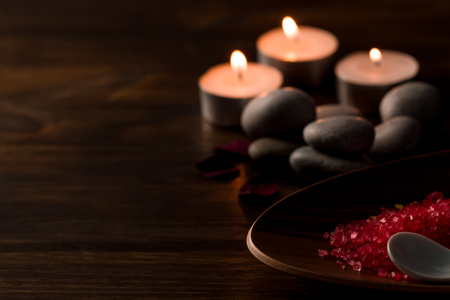 Beautiful Spa composition with aroma candles on wooden . Treatment, aromatherapyの写真素材