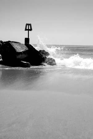 Waves crashing on Beach Groyne, Bournemouth Dorsetの写真素材