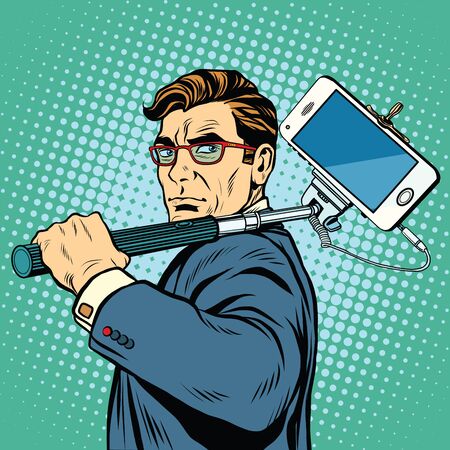 Selfie man with smartphone pop art retro vector. Photography gadgets selfie stickの写真素材