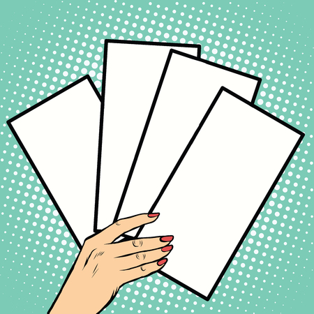 Booklets or tickets in hand pop art retro vector. Business concept pure white formsのイラスト素材