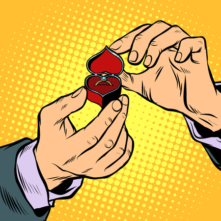 man opens a box with wedding ringのイラスト素材