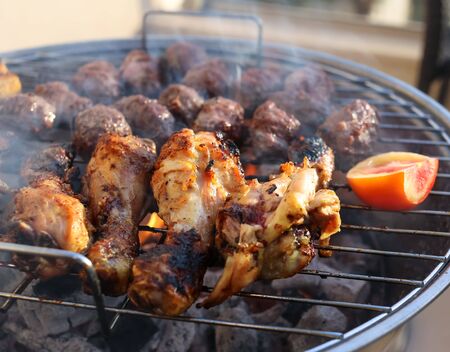 Barbecued chicken and meatballs