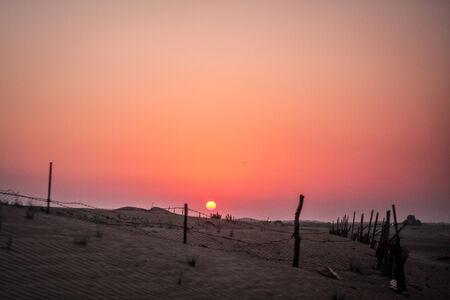 Sunset in Dubai Desertの写真素材