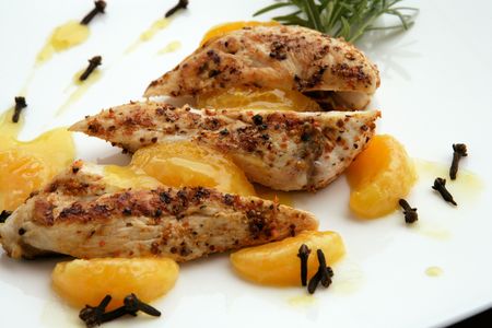 Grilled chicken with orangesの写真素材