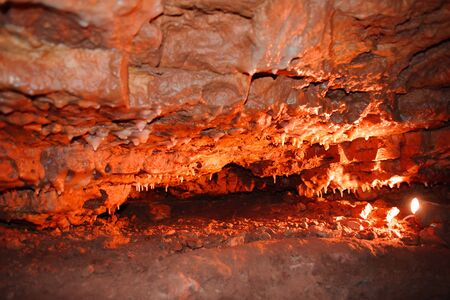 Crystal Cave horizontal, beautiful Crystals Cave are illuminated by light, redの写真素材