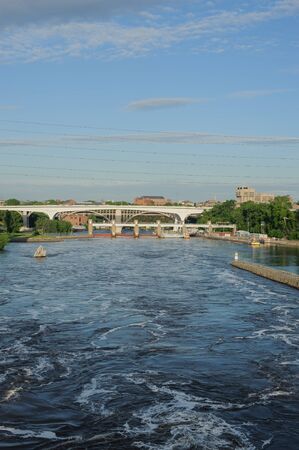 View on Mississippi river Minneapolis, USA, Summer, May 2017, Bridge, verticalのeditorial素材