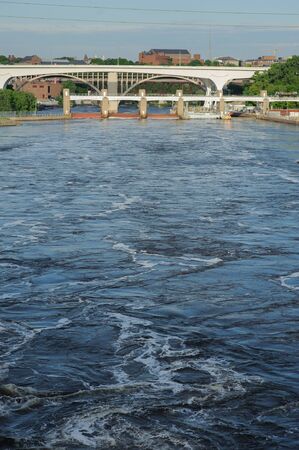View on Mississippi river Minneapolis, USA, Summer, May 2017, Bridge, verticalのeditorial素材