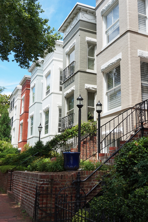 Colored facade of houses with stairs, verticalの写真素材