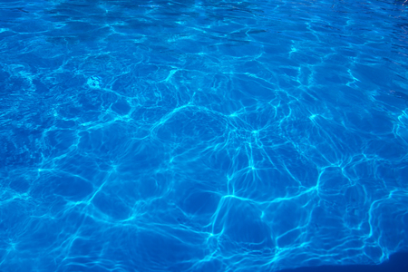 The reflections of the Sun in the swimming poolの写真素材