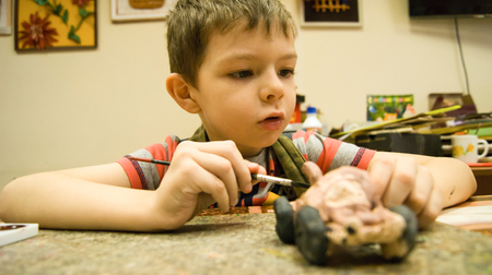 the child is passionate about his occupationの写真素材