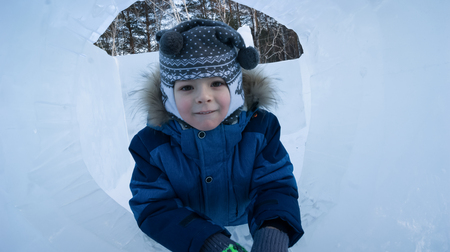 the boy in the window of the ice mazeの写真素材