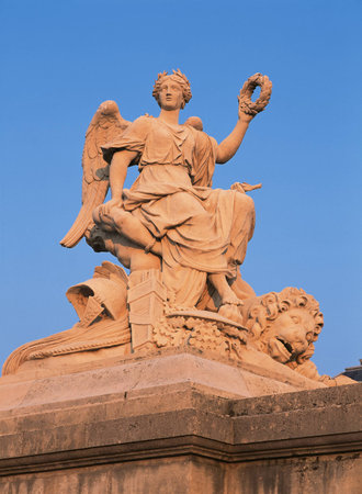 Versailles, France - 13 August 2014 : Statue and exterior view of Versailles Palace ( Chateau de Versailles ) at sunset. It was added to the UNESCO list of World Heritage Sitesのeditorial素材