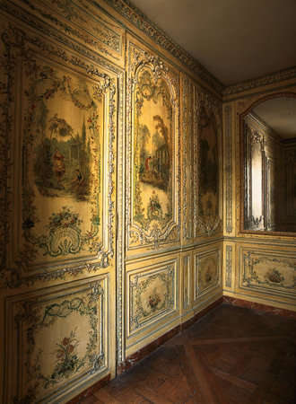 Versailles, France - 10 August 2014 : Mirror and painted wooden wall at Versailles Palace ( Chateau de Versailles ). It was added to the UNESCO list of World Heritage Sites.のeditorial素材