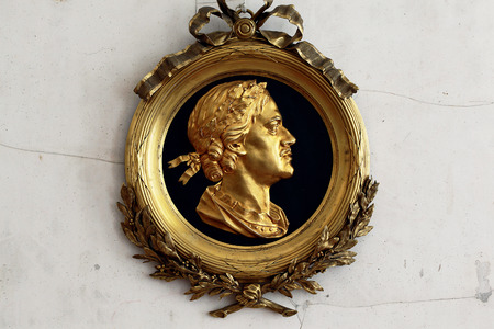 Tsarskoye Selo, Russia - 05 March 2015: Gold medallion Tsarskoye Selo at Pushkin Palace near Saint Petersburgのeditorial素材
