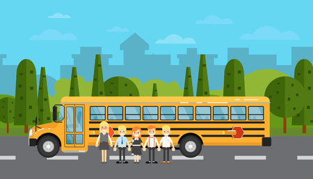 School children near school bus on highway