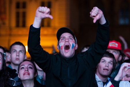 Prague, Czech Republic - 17.5.2012 - Czech fan show trumps down during a hockey transmission on Old Town Squareのeditorial素材