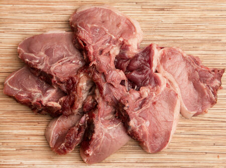 Fresh meat on a wooden backgroundの写真素材