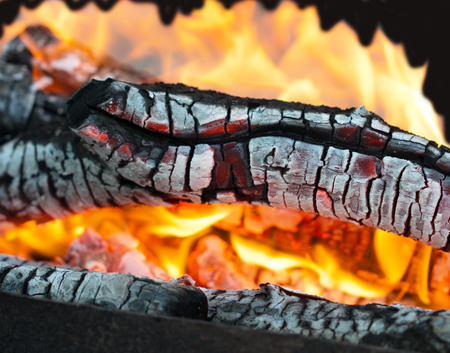 Fire flames on burning coalsの写真素材