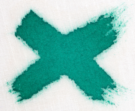 green spot on the white material