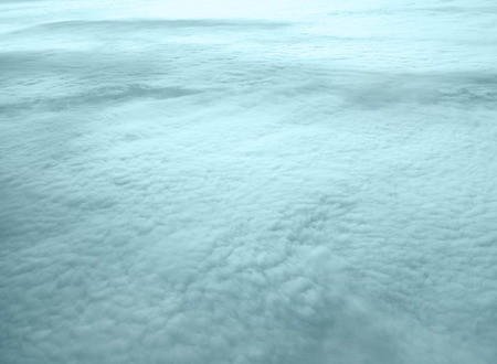 view of clouds from an airplaneの写真素材