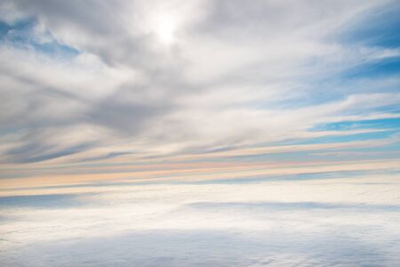 view from the airplane at sunsetの写真素材