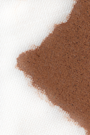 coffee stain on a white materialの写真素材