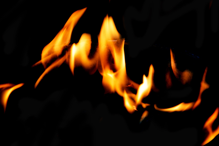 Fire flames on a black backgroundの写真素材