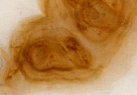 spots of rust on an old white materialの写真素材