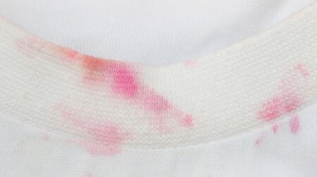 red juice stains on the shirtの写真素材