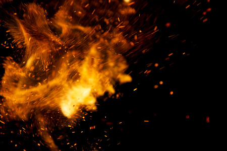 Fire flames on a black backgroundの写真素材